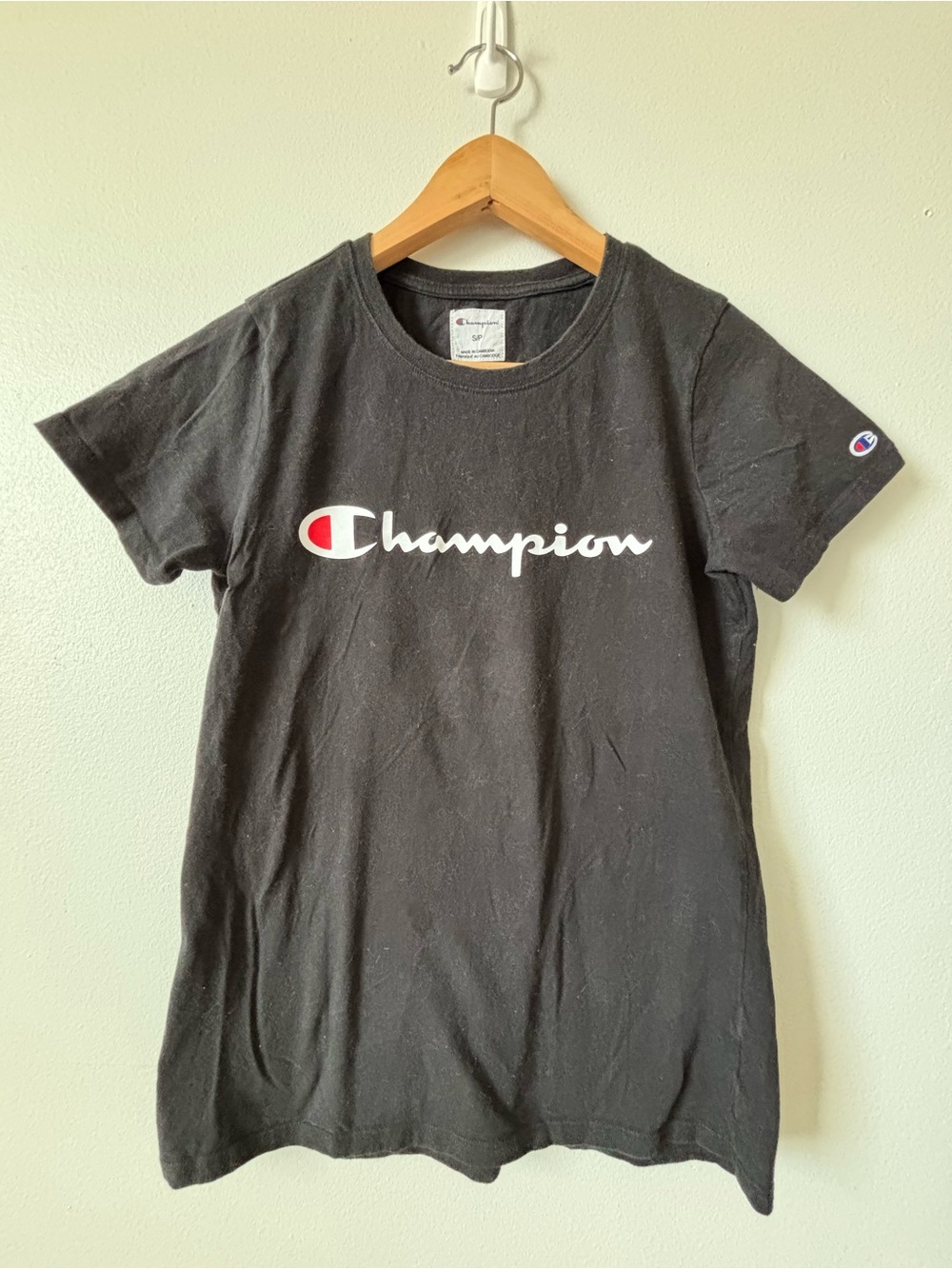 Champion Black Tee with White Script and Red Accent